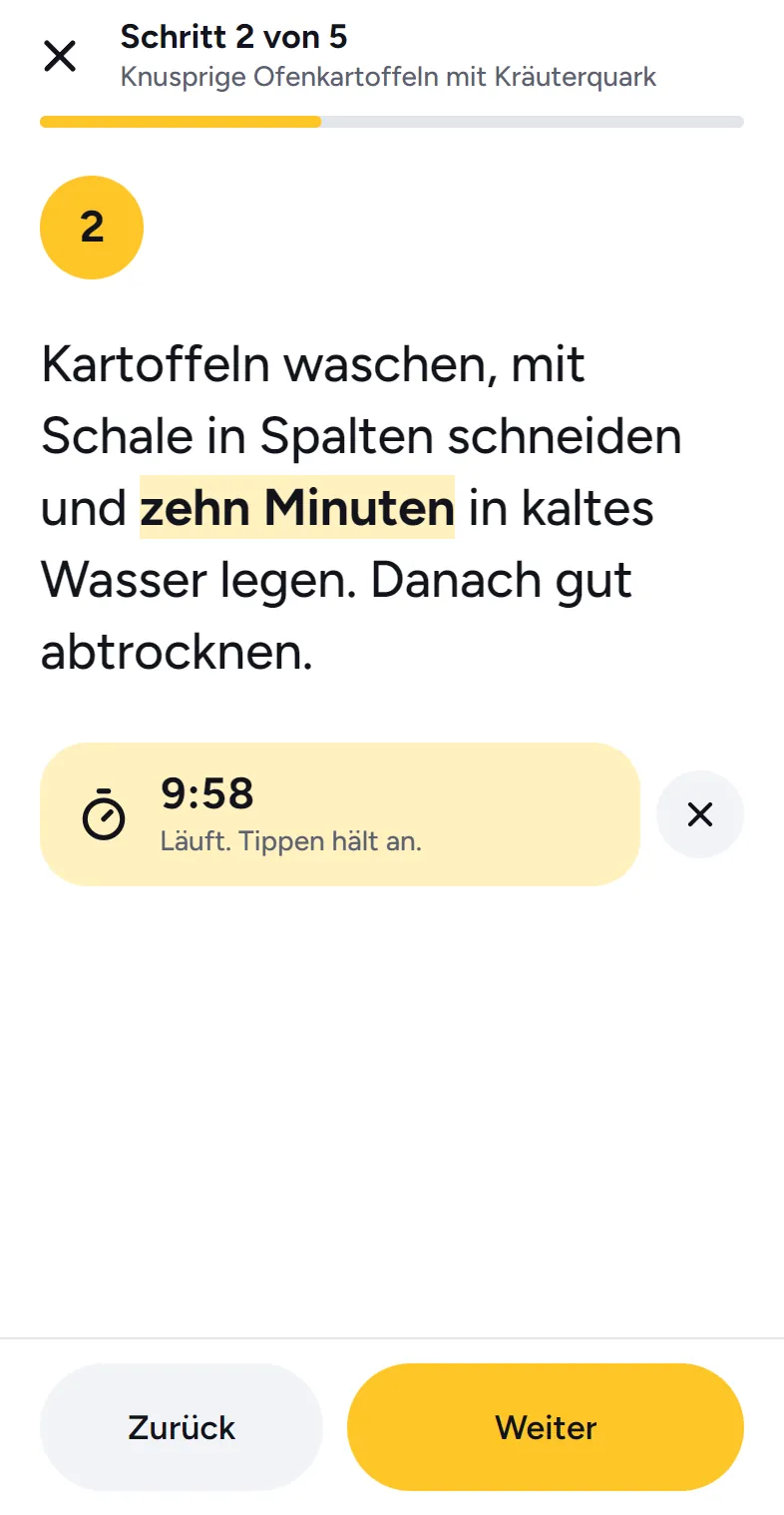 Kochmodus in Kukino: Schritt 2 von 5 in großer Schrift, die Zeit „zehn Minuten“ hervorgehoben, darunter der laufende Timer.
